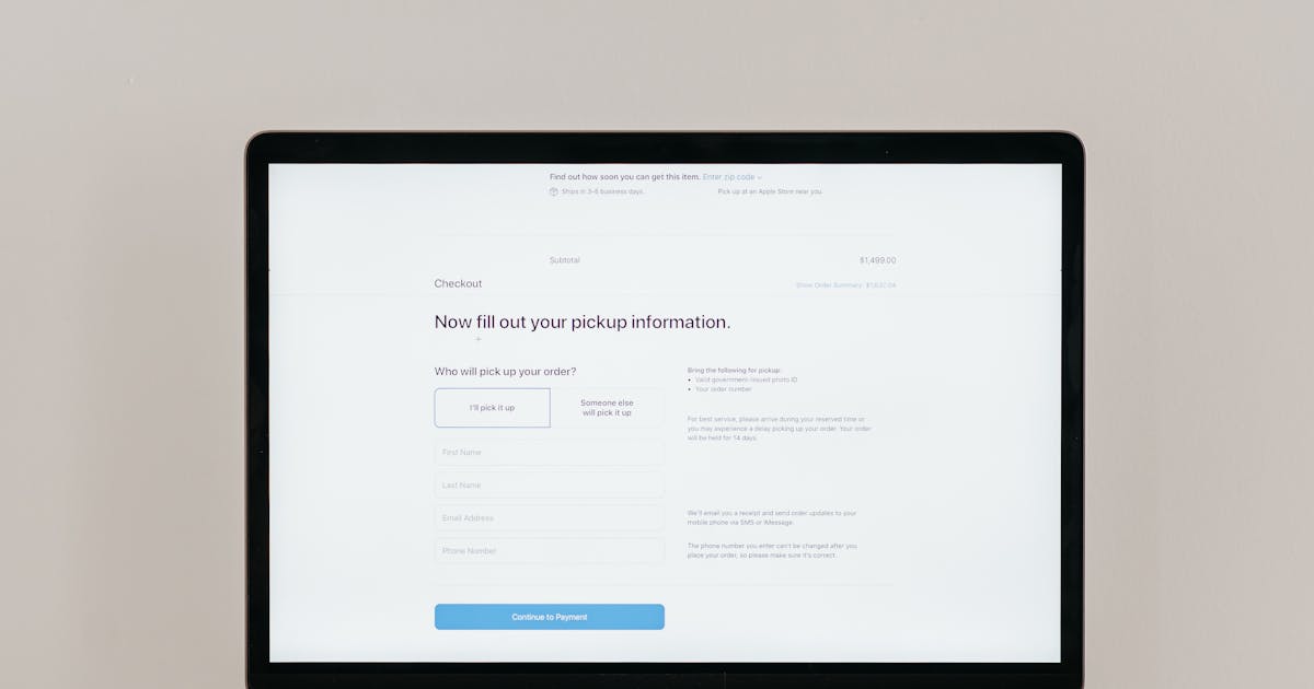 Close-up of laptop screen showing a web form interface